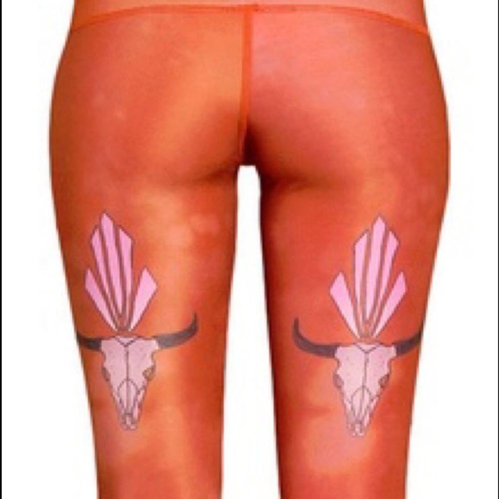 Size S burnt orange skull yoga leggings